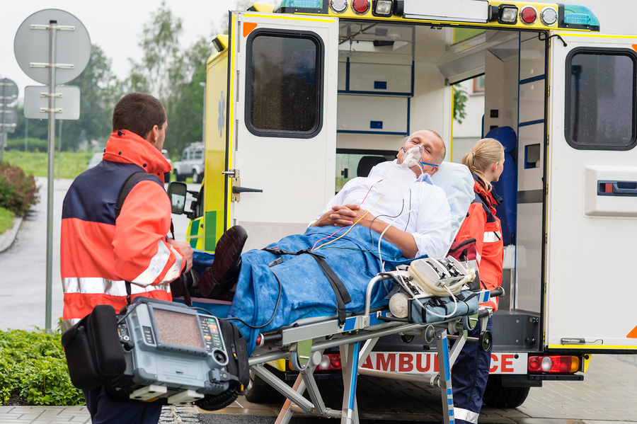 Injured man getting into ambulance